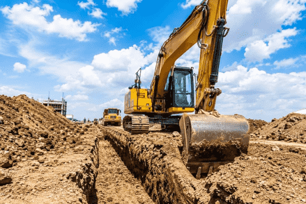 Excavators, bulldozers and dump trucks used for earthmoving in Dubai