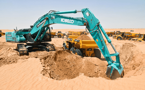 Barricaded demolition site with dust control and safety supervision